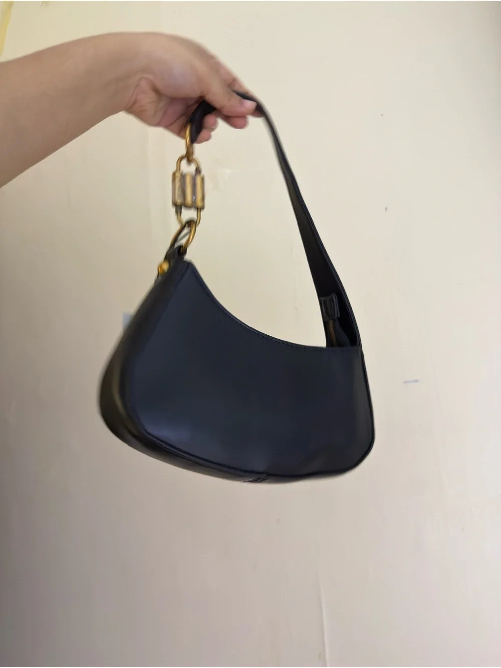 Steve Madden Black Crescent Shoulder Bag with Gold Accents